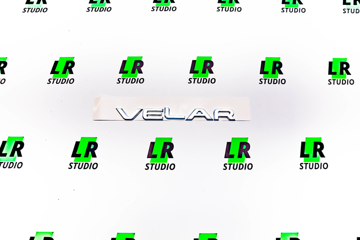 Шильдик ( Эмблема ) VELAR серая